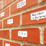 Notes of positivity on a Collingswood wall in Camden County